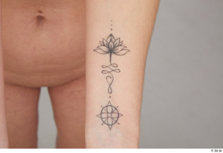 Mia Brown forearm nude tattoo 0002.jpg